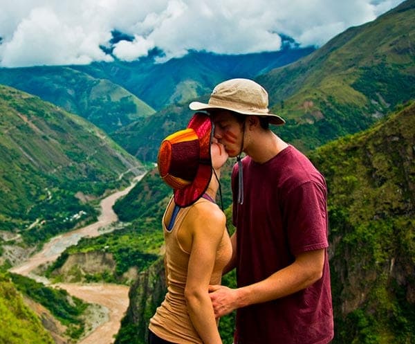 Hikers traversing tropical cloud forest trails on the Inca Jungle route to Santa Teresa