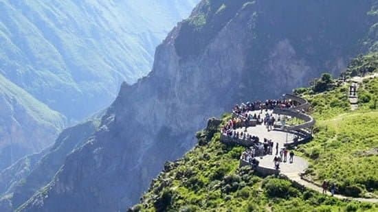 Scenic pre-Inca terraced valley of Chivay and natural volcanic thermal hot springs in Colca