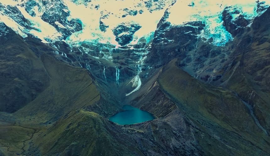Humantay Glacier Lake Trek | Daspe Travel Turquoise glacial waters of Lake Humantay at 4,200m (13,779 ft) beneath Mount Salkantay, Mollepata, Cusco