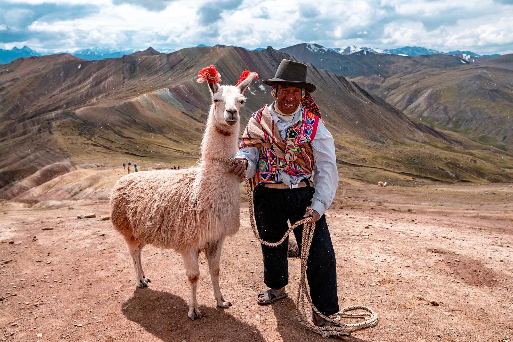 Wide panorama of the three striped mineral ridges at Palcoyo without the crowds of Vinicunca