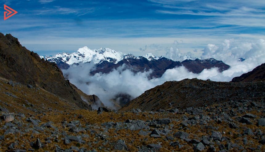 Trekker walking the alpine switchback trail toward Salkantay Pass at 4,630m (15,190 ft), Cusco, Peru