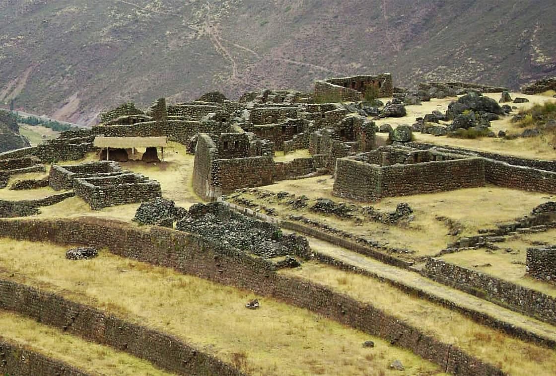 Classic Sacred Valley: Pisac Market & Ollantaytambo Fortress - View 1 | Daspe Travel Expansive Incan agricultural terraces clinging to the steep cliffs of Pisac